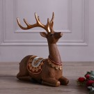 Et sittende reinsdyr fra THE SEASONAL GIFT CO® thumbnail