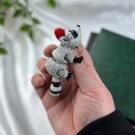 Vaskebjørn med nisselue thumbnail