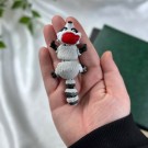 Vaskebjørn med nisselue thumbnail